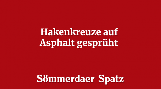 Hakenkreuze auf Asphalt gesprüht